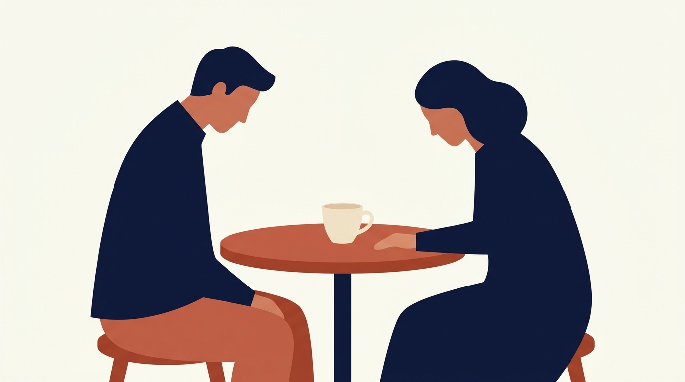 Two people at a small table: serious body language, one empty cup between them, the visual weight of a difficult-but-respectful conversation